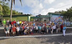 Image of over 100 people on the island of Santa Cruz